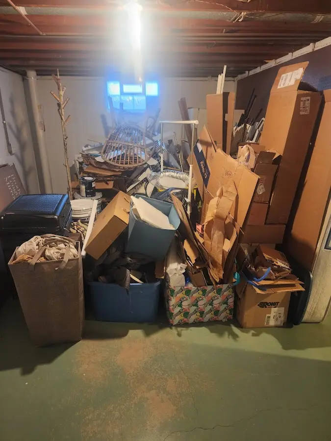 Roll-off dumpster container at job site for Yard Waste Dumpster Rental in Wilkshire Hills